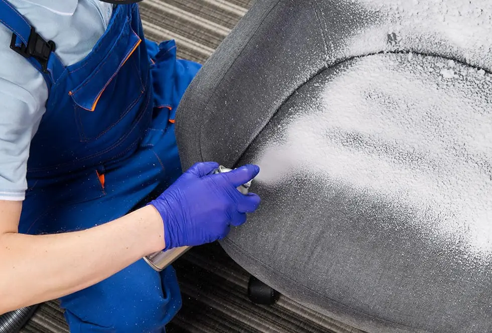 applying cleaning foam from a balloon in your hand, close-up